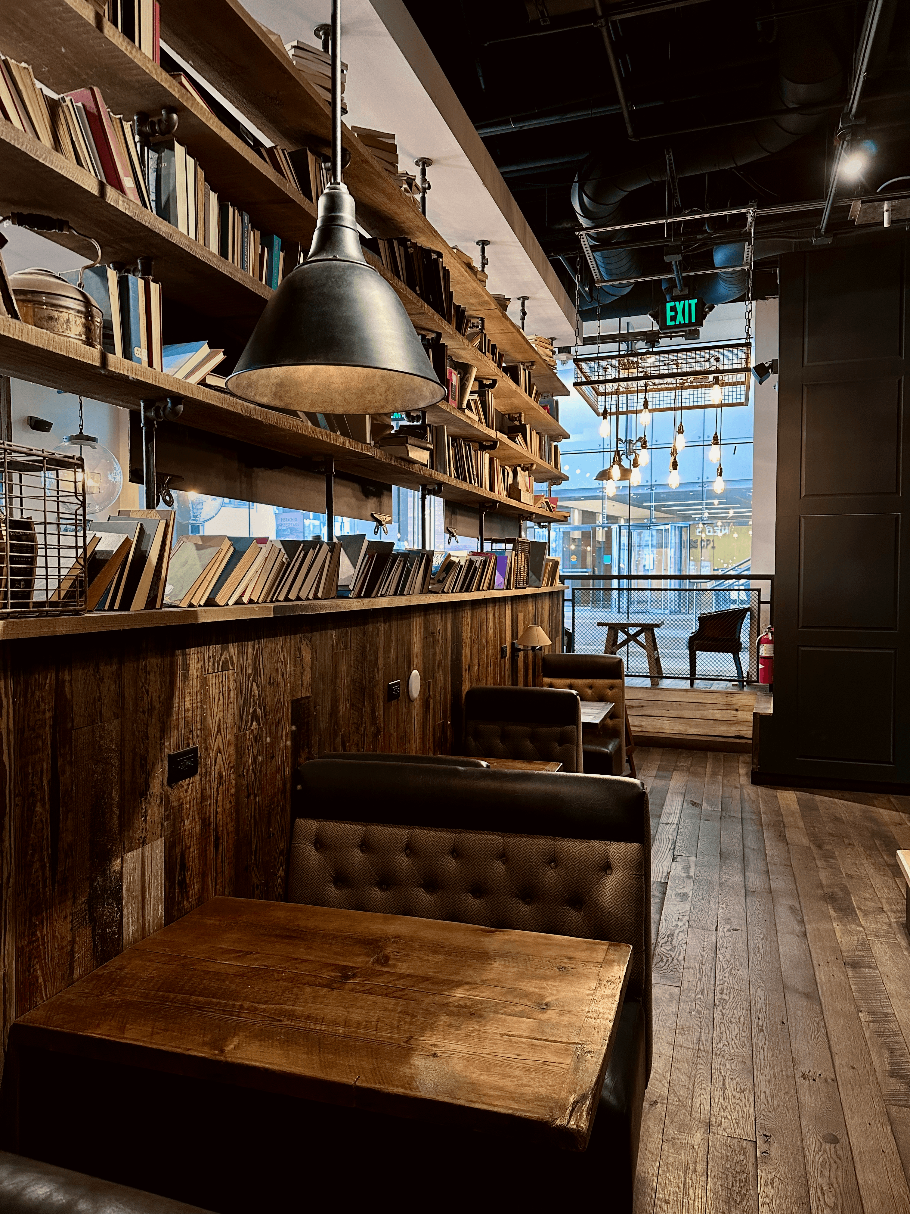 Cozy tables and books at Cafe Nero in Boston, Massachusetts